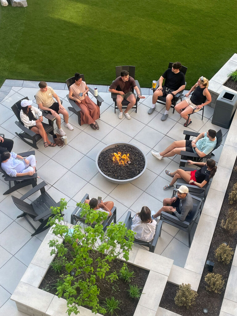 Outdoor fire pit terrace at The Pearl luxury apartments in Fort Wayne