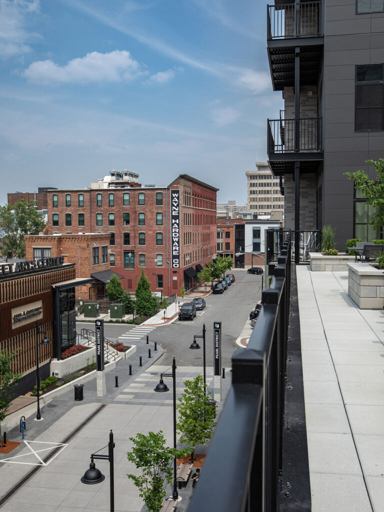 Vibrant streetscape and Pearl apartment community in downtown Fort Wayne